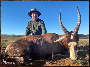 Client with a blesbok shot on a spot and stalk hunt.