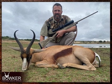 Client with a copper springbok shot while on an African hunting trip.