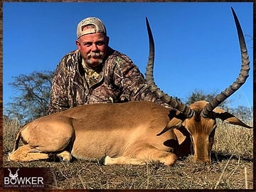 Client with an impala shot on a spot and stalk hunt.