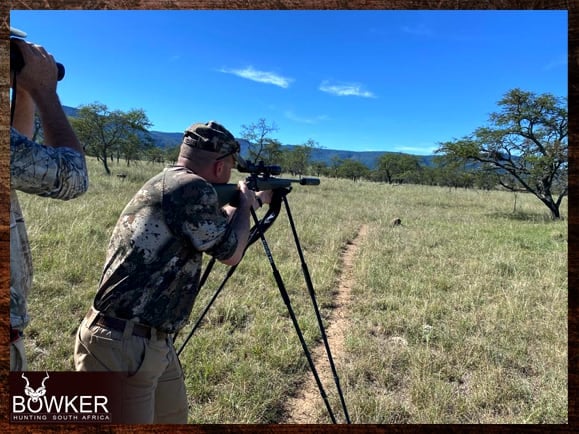 Client using shooting sticks while hunting in South Africa