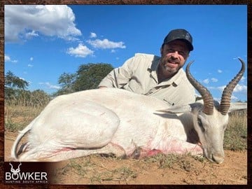 Client with a White springbok trophy taken while hunting in South Africa. 